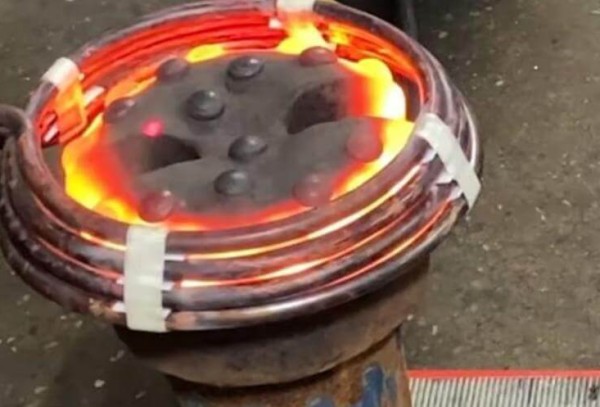 Induction post-heating of old tools for recycling
